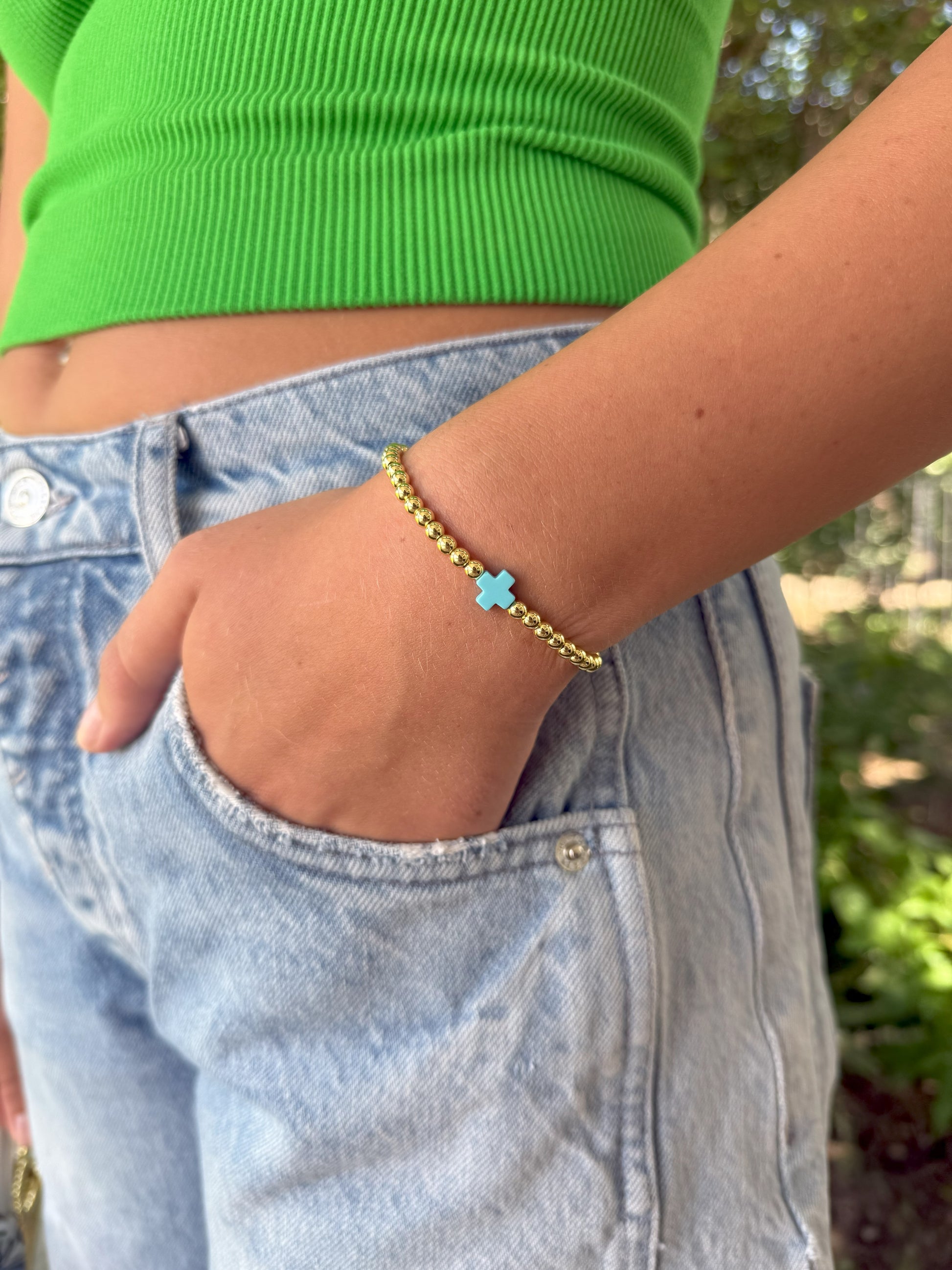 Victoria Gold Tone 3.8mm Bracelet with Turquoise Colored Cross Accents